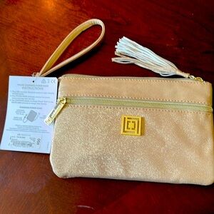 Liz Claiborne brand new phone charging wristlet shiny gold
